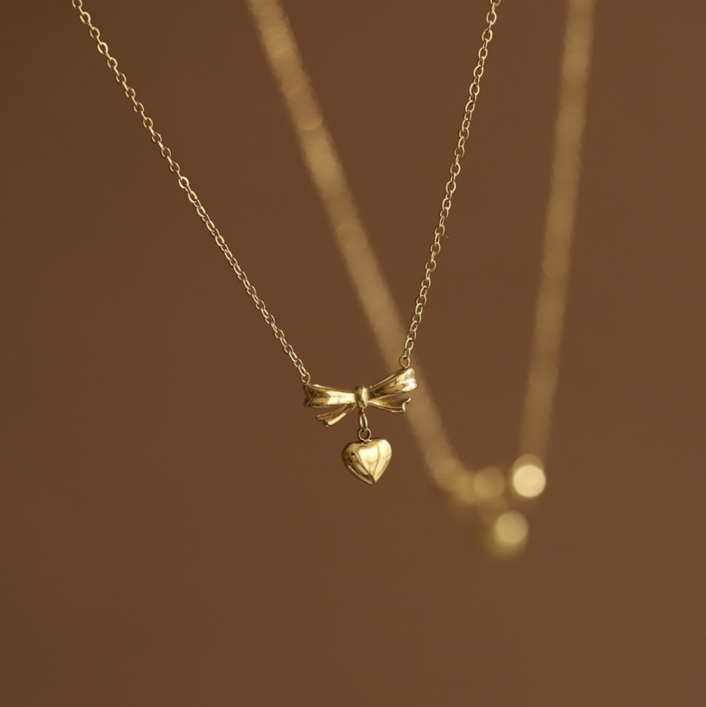 18k Coquette Tiny Bow Heart Pendant Necklace